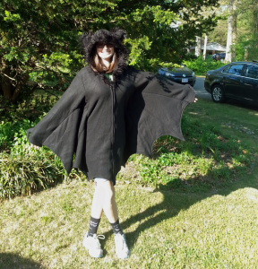 A photograph of blogger Rachael wearing a really cure bat jacket